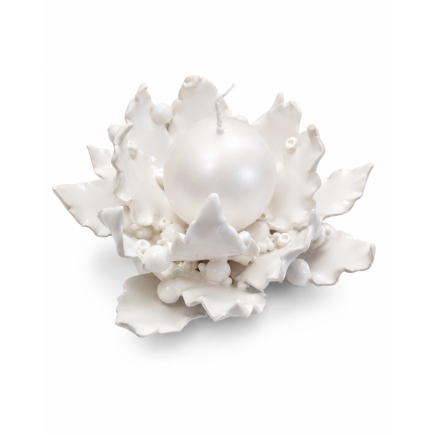 White ceramic candle holder with leaf arrangement and pearl candle.