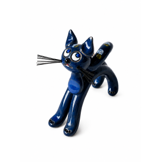 White ceramic cat with blue decorative elements.
