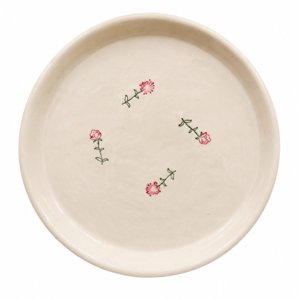 Handmade ceramic decorative plate with delicate wildflower illustrations and a minimalist design.