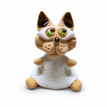 White ceramic cat figurine with a playful expression