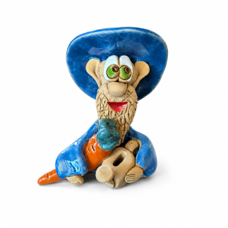 Blue ceramic house gnome gardener with carrot
