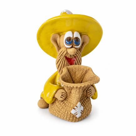 Yellow ceramic house gnome with a sack