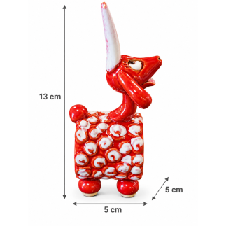 Playful red ceramic goat souvenir