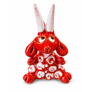 Red ceramic little goat souvenir with curls