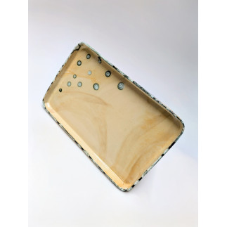 Close-up of handmade colored clay coaster – unique and decorative