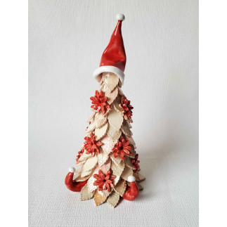 Dekoratyvi eglutė su raudona nykštuko kepure